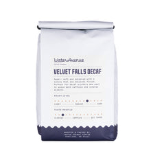 Load image into Gallery viewer, Coffee bag labeled 'Velvet Falls Decaf' from Water Avenue Coffee Company on a white background